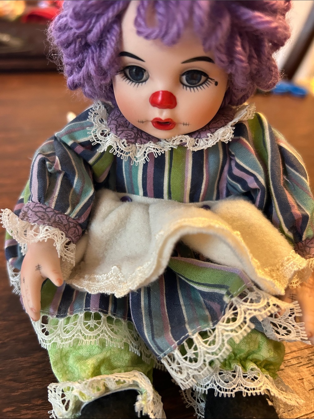 2006 Marie Osmond Porcelain Clown Doll with Purple Hair and Striped Outfit